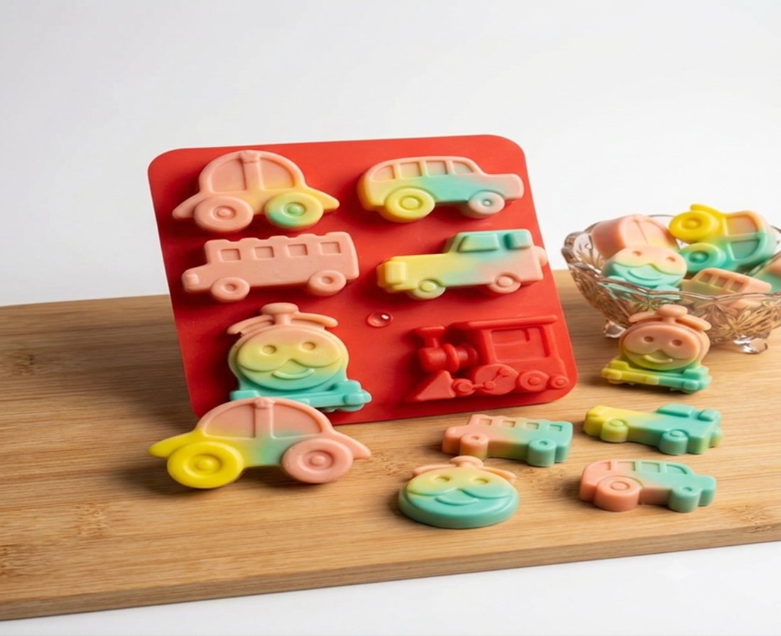 Colourful transport-themed soap moulds and handmade soaps